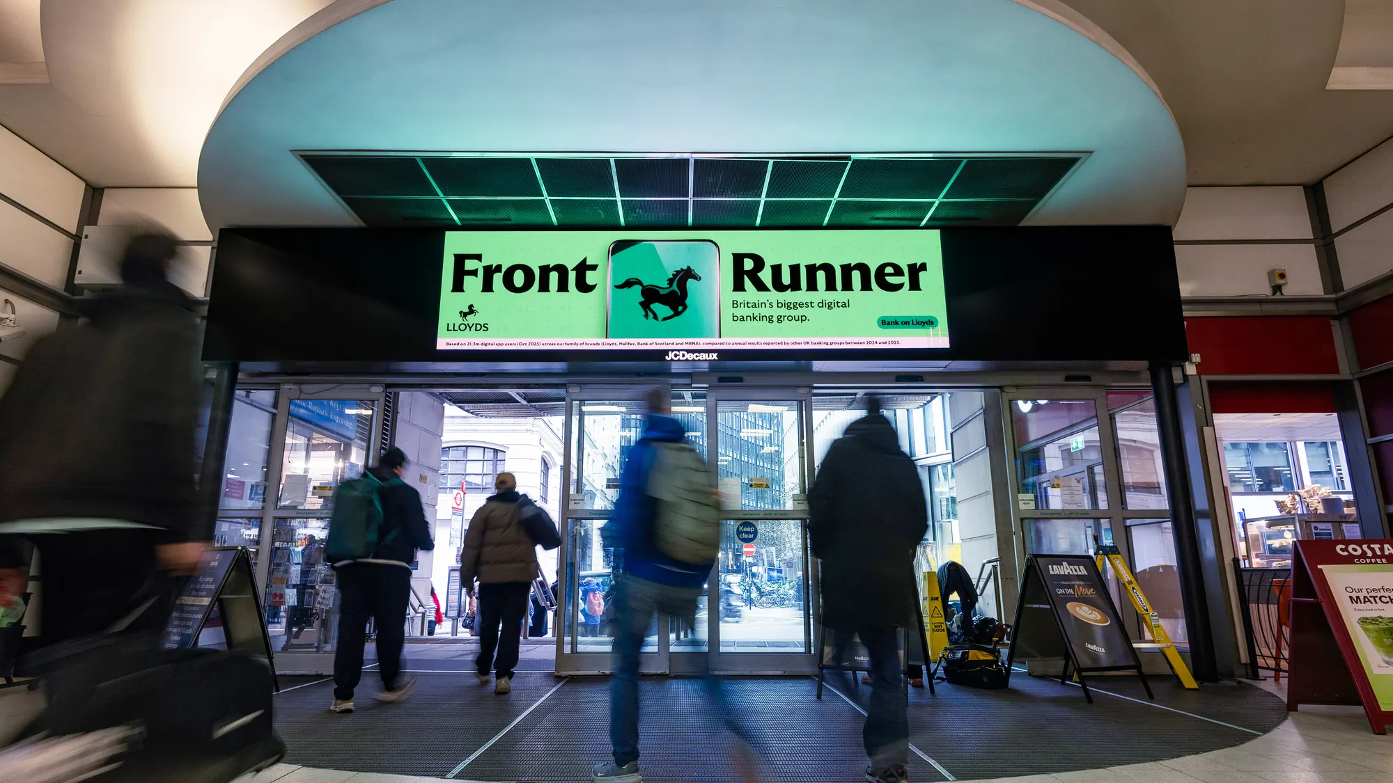 Front Runner above the entrance at City Thameslink station