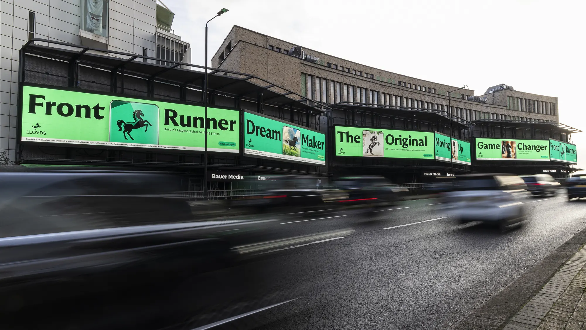 Every animation in a row along roadside screens on Cromwell Road