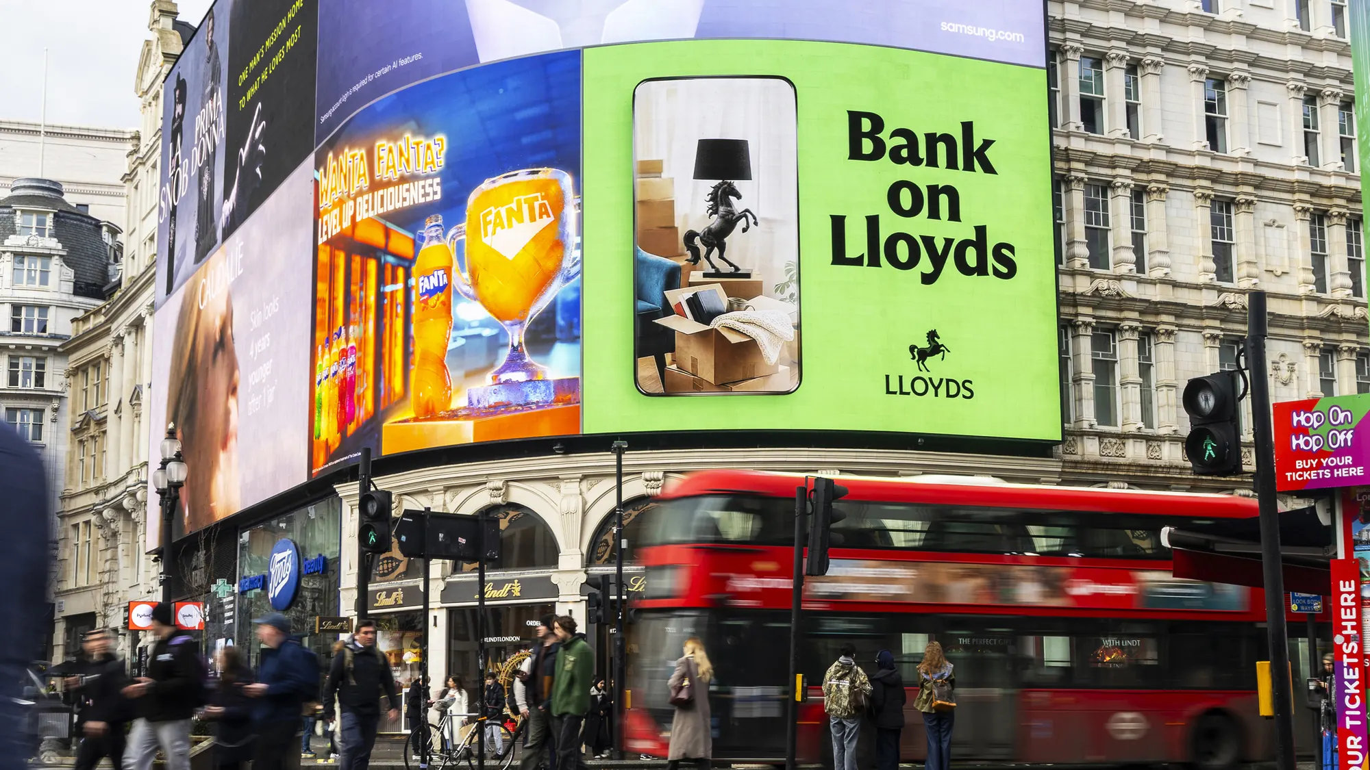 Moving Up on the Piccadilly Lights